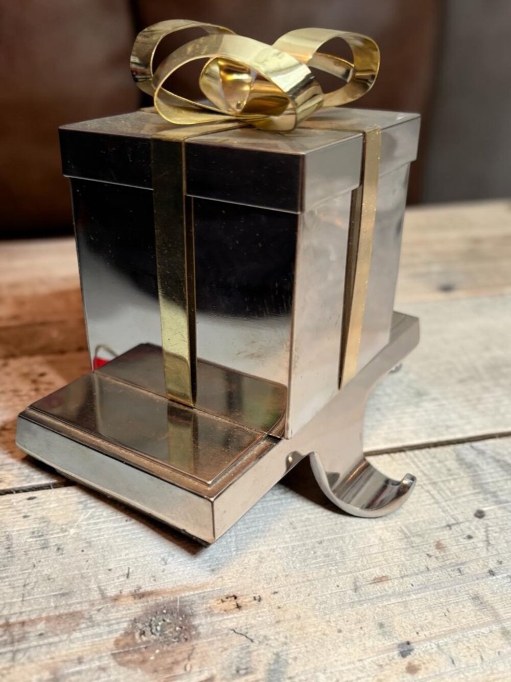 Gift-Shaped Silver Metal Stocking Holder With Gold Bow